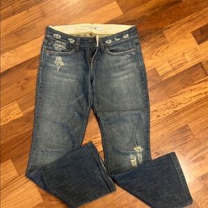 Distressed Blue Jeans